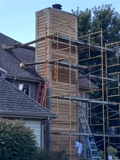 Damaged Siding and Chimneys