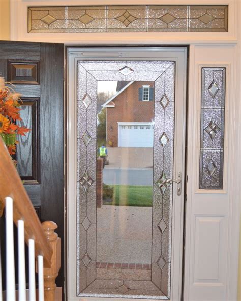 Protect your decorative glass entry door with double storm doors by ProVia. Recently installed