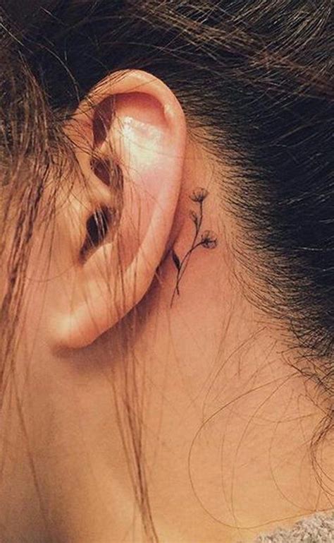 Delicate Floral Tattoo Behind the Ear