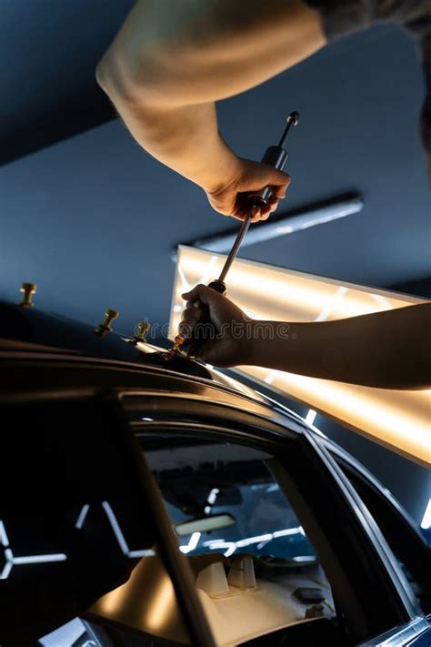 Dent Repair Using Specialized Tools