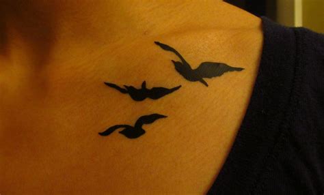 Divergent Bird Tattoo