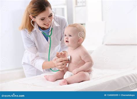 Doctor Examining Baby