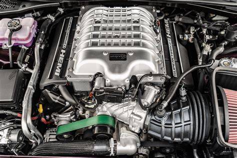Dodge Challenger engine showcasing V8 power in a Dodge vs Ford Mustang comparison