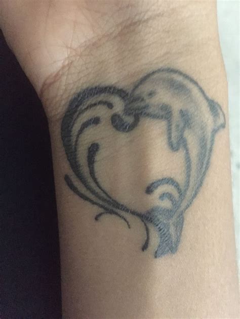 Dolphin wrist tattoo Tattoos, Infinity tattoo, Wrist tattoos
