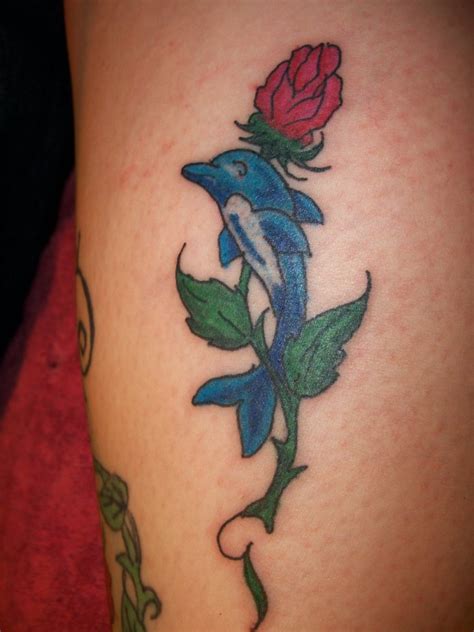 Dolphin Tattoos Designs Meanings