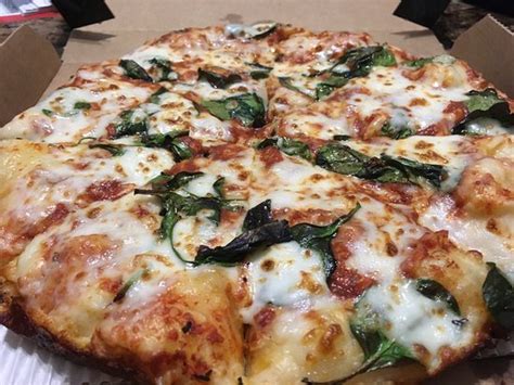 Satisfy Your Deepest Cravings with the Mouthwatering Dominos Black Box Pizza – A Slice of Heaven in Every Bite!