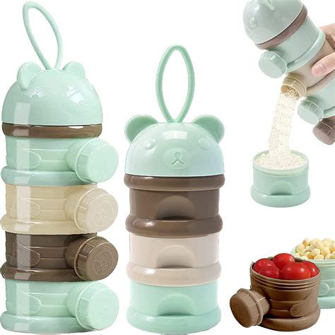 NUK Doseur de lait en poudre violet au meilleur prix sur idealo.fr