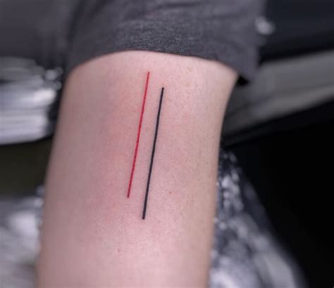 Discover the Bold Beauty of Double Line Tattoos Today!