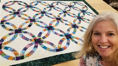 Stitching Memories Together: Discover the Heartwarming Beauty of our Double Wedding Ring Quilt Pattern Paper Pieced