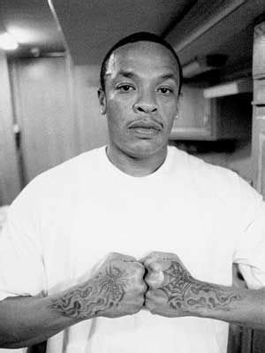 What happens to Dr Dre Spider Web Tattoo?