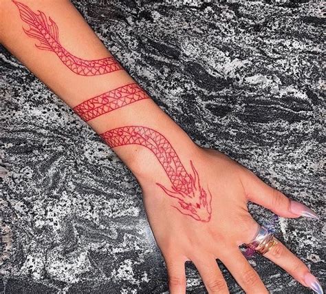 shesicko Hawaiian tattoo, Dragon tattoo wrist, Tattoos