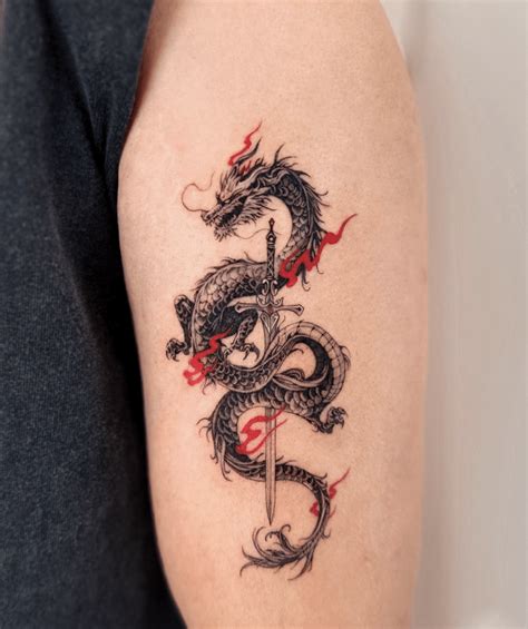 Dragon With A Sword Tattoo