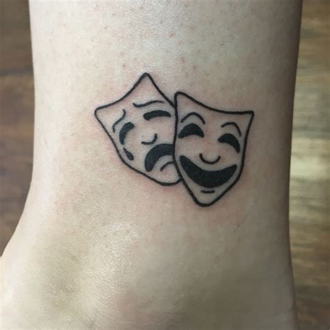 Tragedy and comedy mask theatre tattoo Theatre tattoo