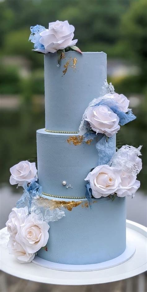 Indulge in Romance with a Dreamy Dusty Blue Wedding Cake