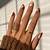 Effortlessly Stylish: Nail Art That Radiates the Beauty of Fall Browns