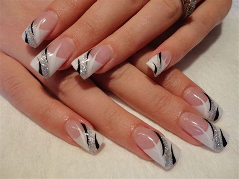 would be nice wedding nails! classy French tips with a touch of sparkle