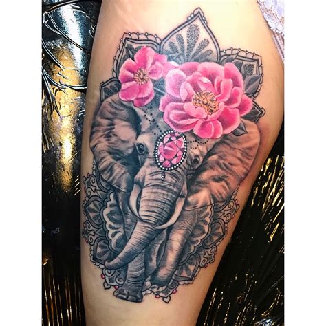 Elephant Tattoo With Flowers