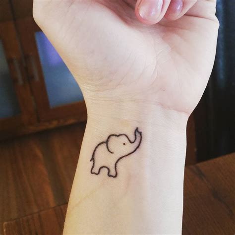 Wrist tattoo of an elephant on María José.