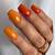 Elevate Your Fall Vibes: Flaunt Enchanting Burnt Orange Nail Ideas with Finesse