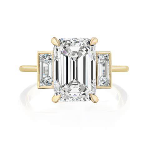 Emerald side stone settings