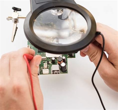 Emergency Lamp Repair - Technician Working on a Lamp Quickly