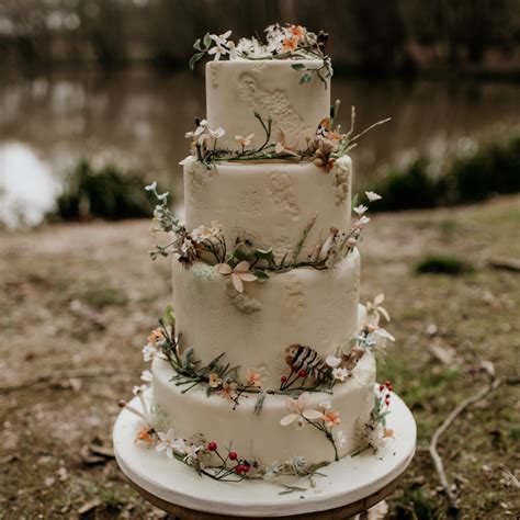 A Magical Love Story Unfolds: The Enchanted Beauty of our Forest Wedding Cake