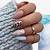 Enchanting Fall: Trendy Nail Sets to Mesmerize in the Colder Months