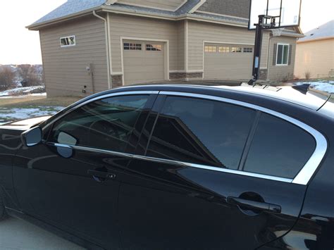Image of a car with tinted windows. The image includes a quote from a satisfied customer.