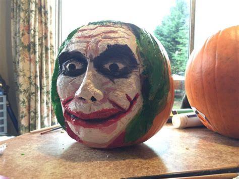 Different Styles of Painted Joker Pumpkins