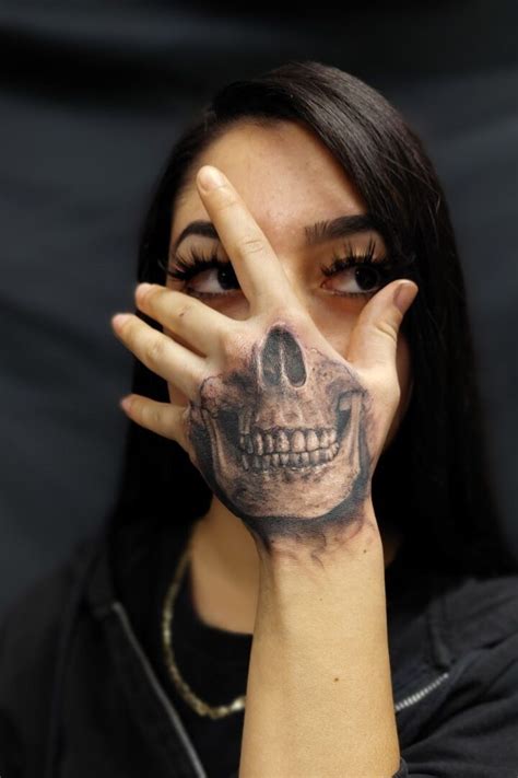 Face Hand Tattoo