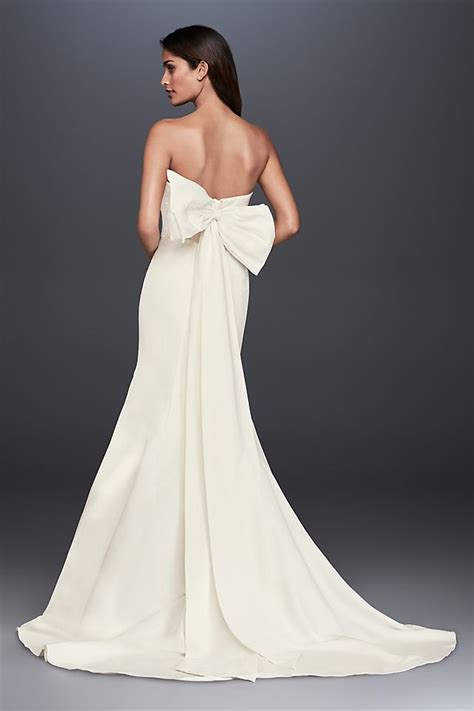Enchanting and Elegant: Unleash Your Inner Mermaid with Our Faille Wedding Dress featuring a Stunning Bow Back Design.