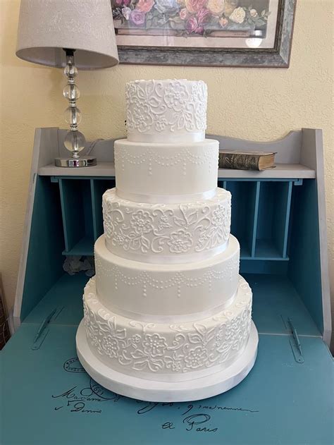 Fulfill Your Sweetest Wedding Dreams with Our Scrumptious, Picture Perfect Fake Wedding Cakes - Only a Step Away!