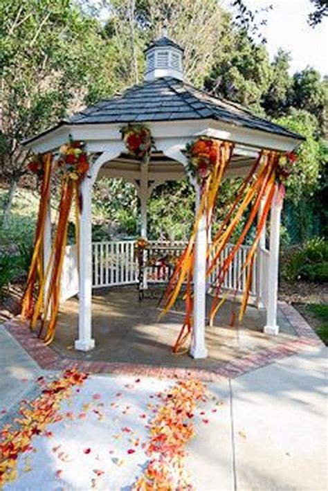 Embrace the Beauty of a Magical Autumn Affair - Breathtaking Gazebo Wedding Decorations to Make Your Big Day Unforgettable!