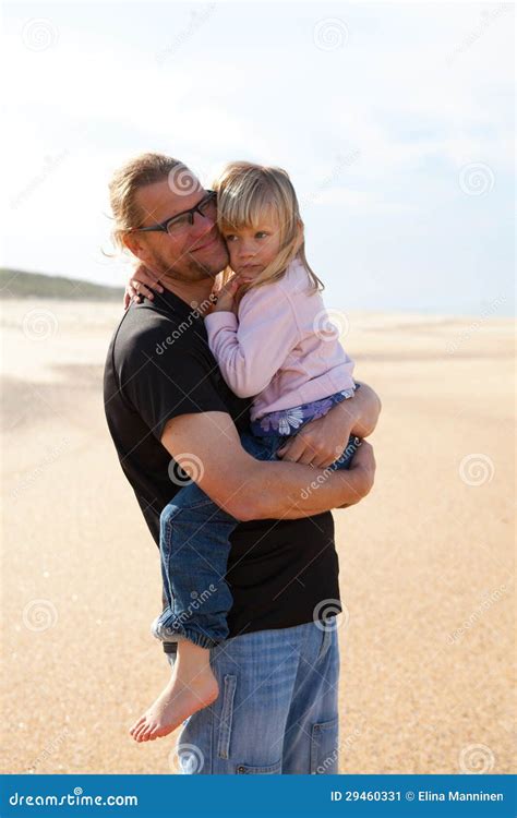 Father Holding Daughter