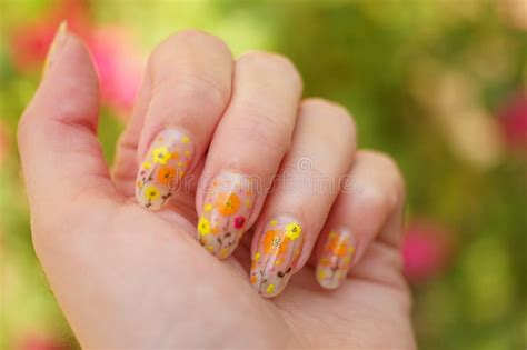 Female Hand Beautiful Floral Manicure