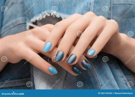 Female Hand Blue Nail Design