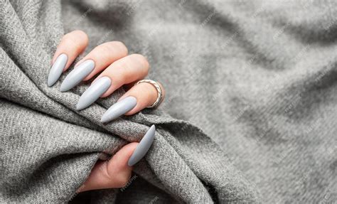 Female Hand Gray Nail Design