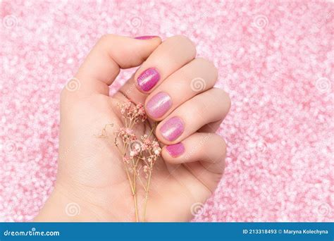 Female Hand Pink Nail Design