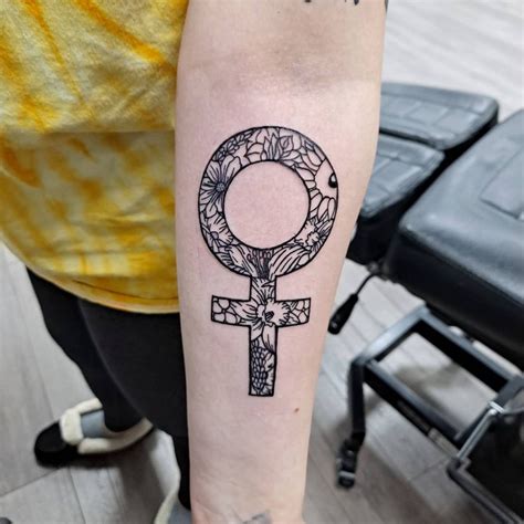 Female Symbol Tattoo