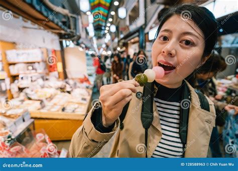 Female Traveler Eating