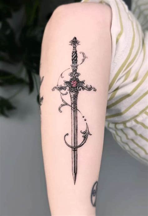 Feminine Sword Tattoo