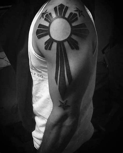 Filipino tribal sun tattoo