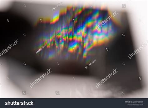 Find a Composition with the Flare Crossing Over a Dark Surface