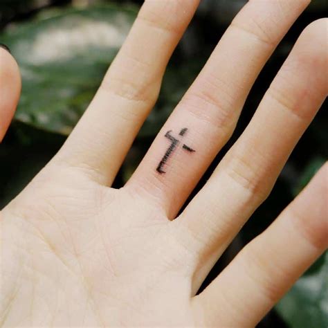 Cross finger tattoo Cross finger tattoos, Finger tattoo