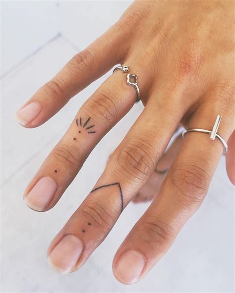 40 Tiny Finger Tattoos That Define Perfection TattooBlend
