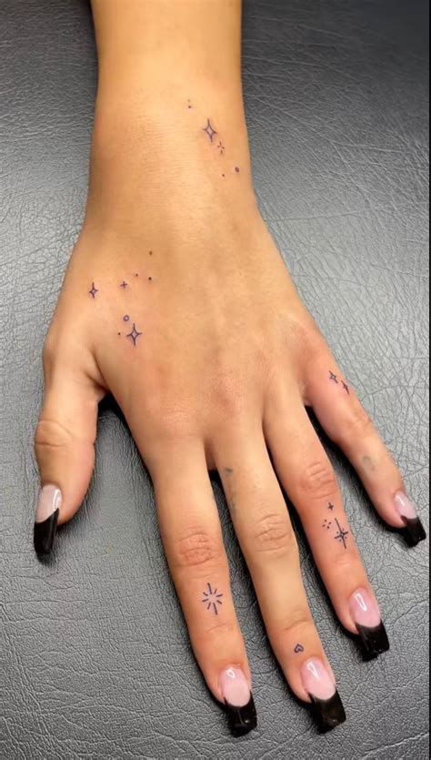 Finger Tattoos Stars