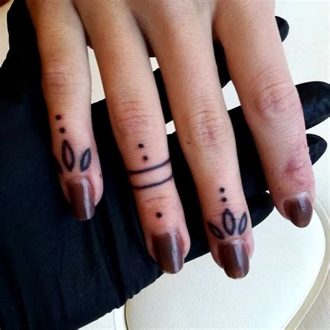 Fingertip Tattoo Designs
