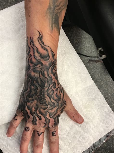 Fire Hand Tattoo