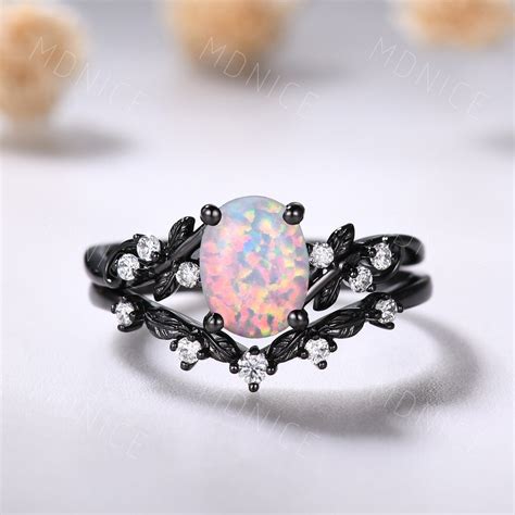 Spark Love For Eternity with Our Enchanting Fire Opal Wedding Ring Set