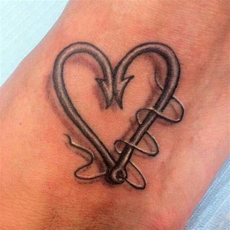 Antler and fish hook heart tattoo. Fishing hook tattoo